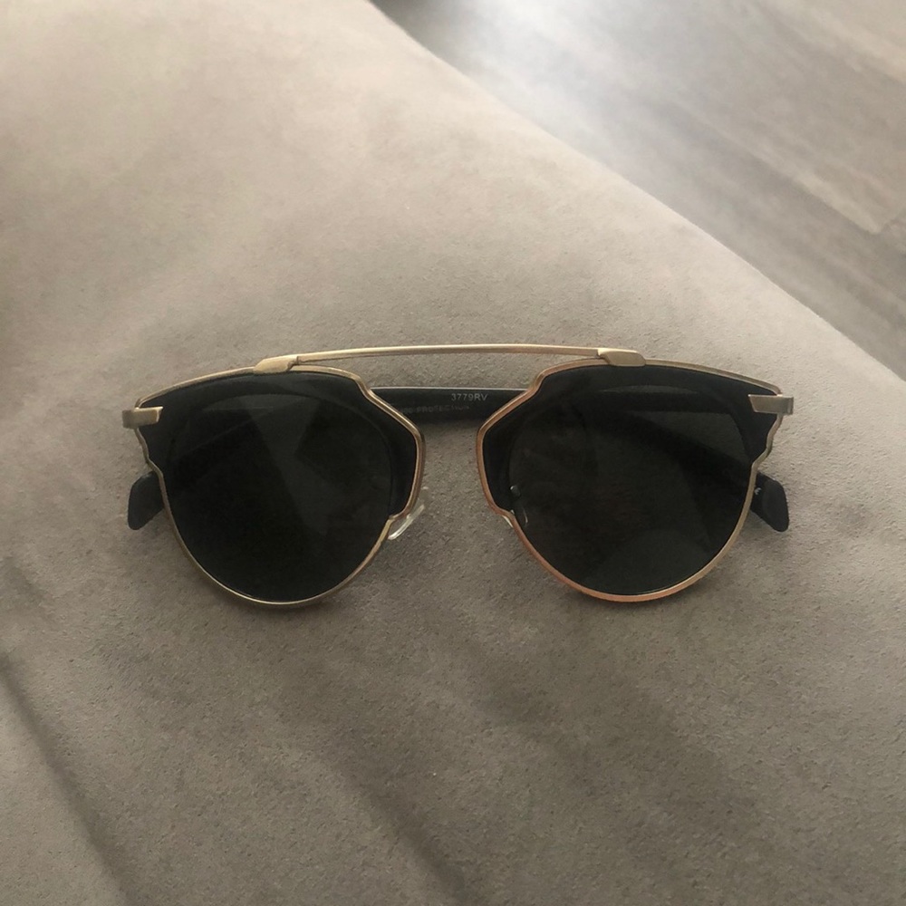 Gold and black never worn sunglasses